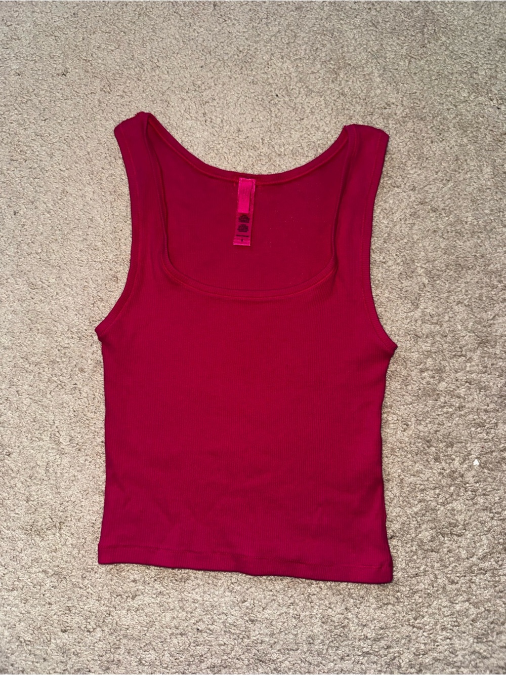 Skim pink tank top size small